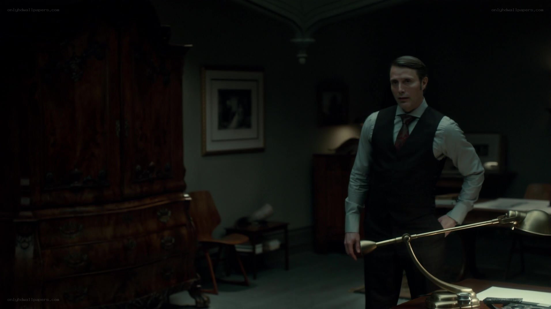 man in a dark room