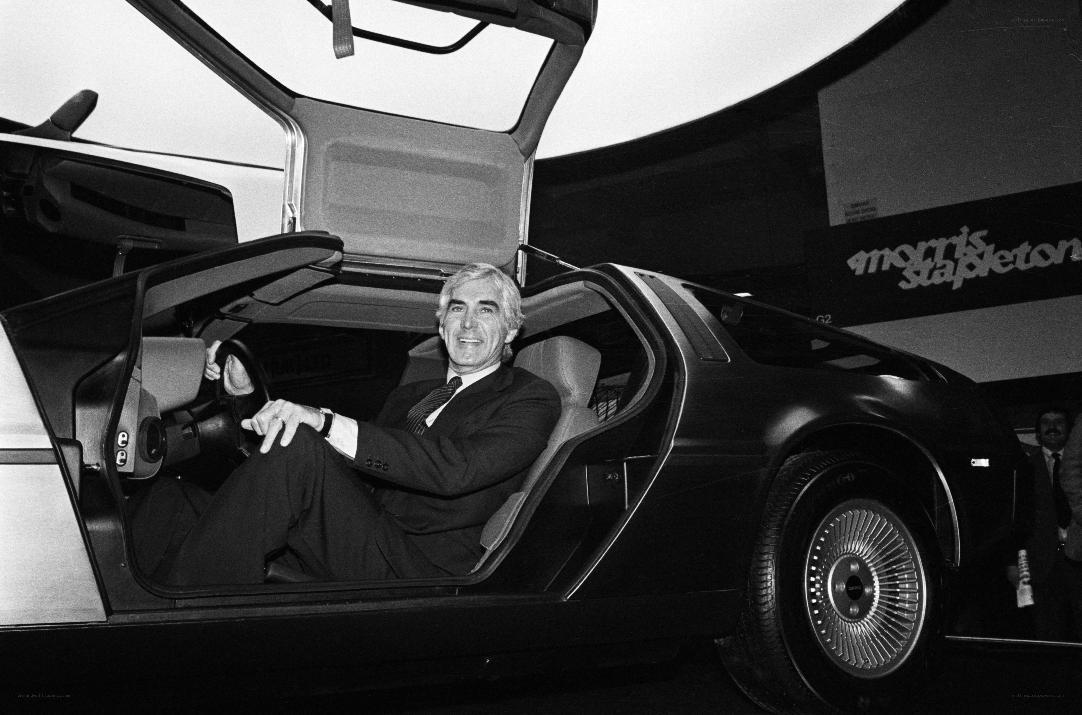 Man in a DeLorean car
