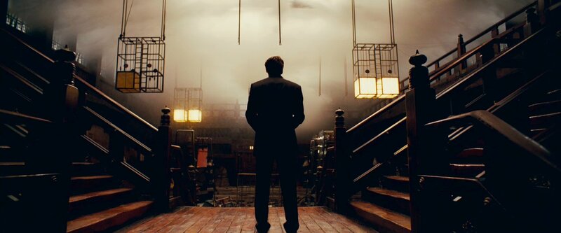 man in a dimly lit hall