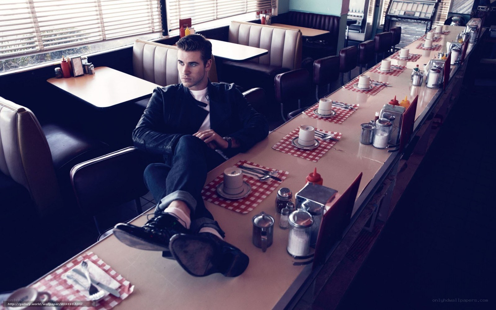 Man in a diner booth