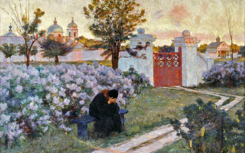 Man in a garden at dusk