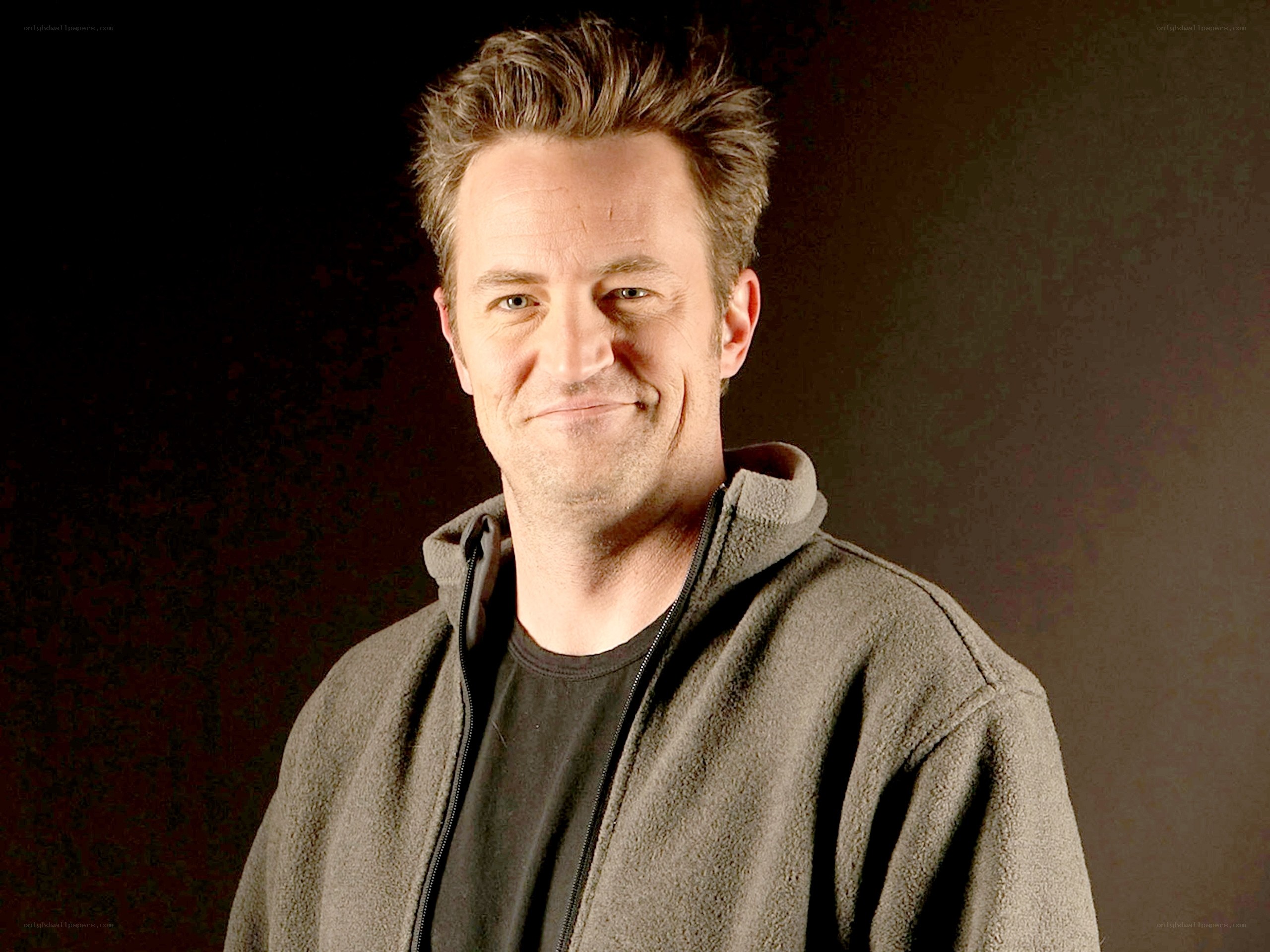 Man in a gray hoodie