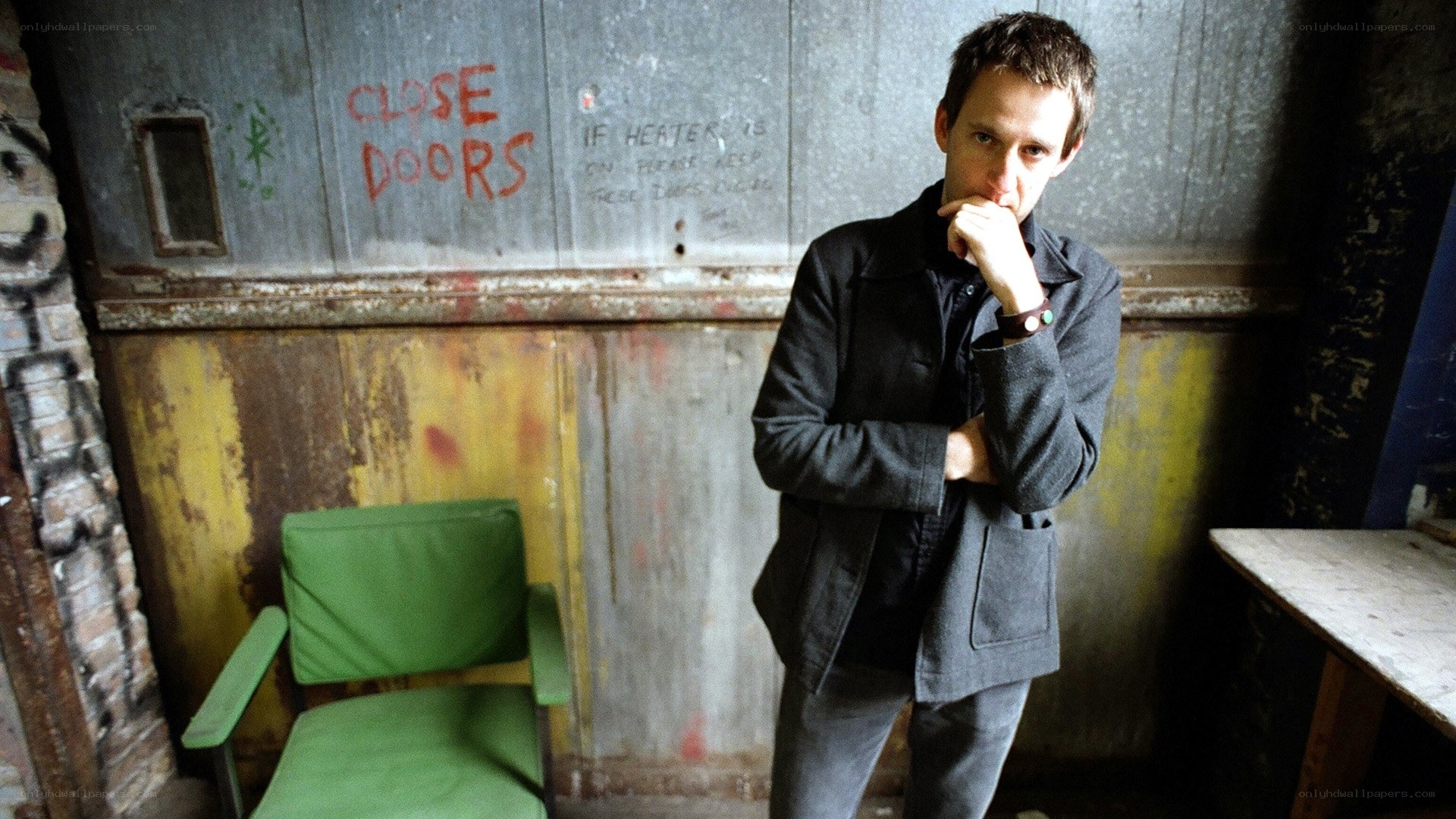 man in a grungy room