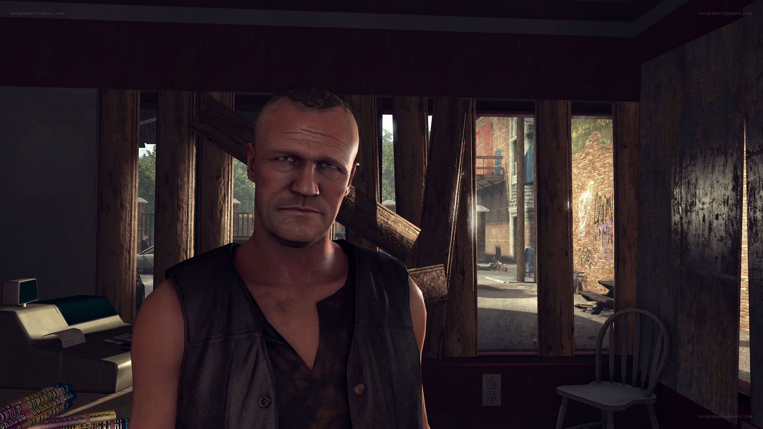 man in a leather vest