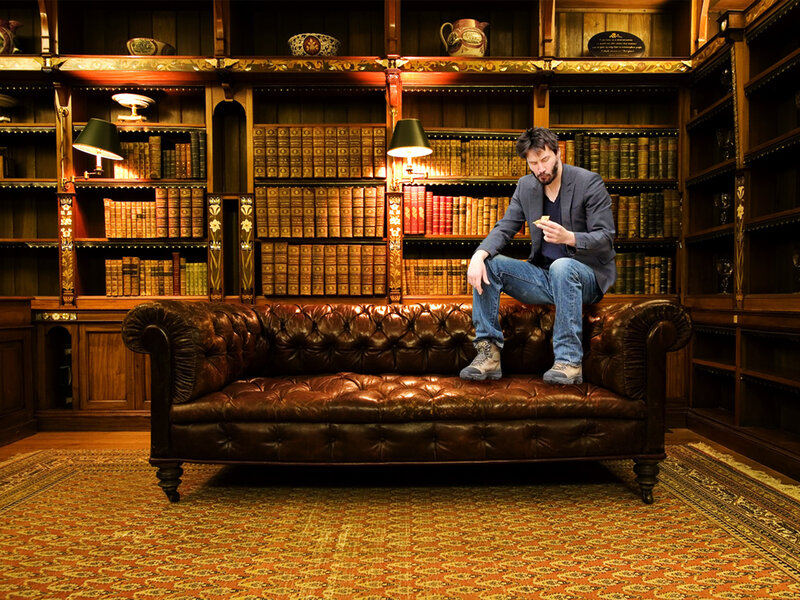 Man in a library reading