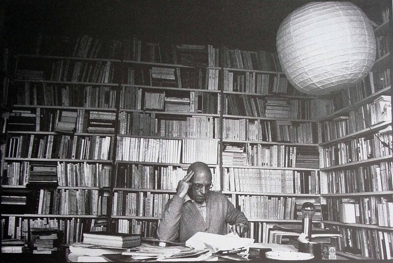 Man in a library with books