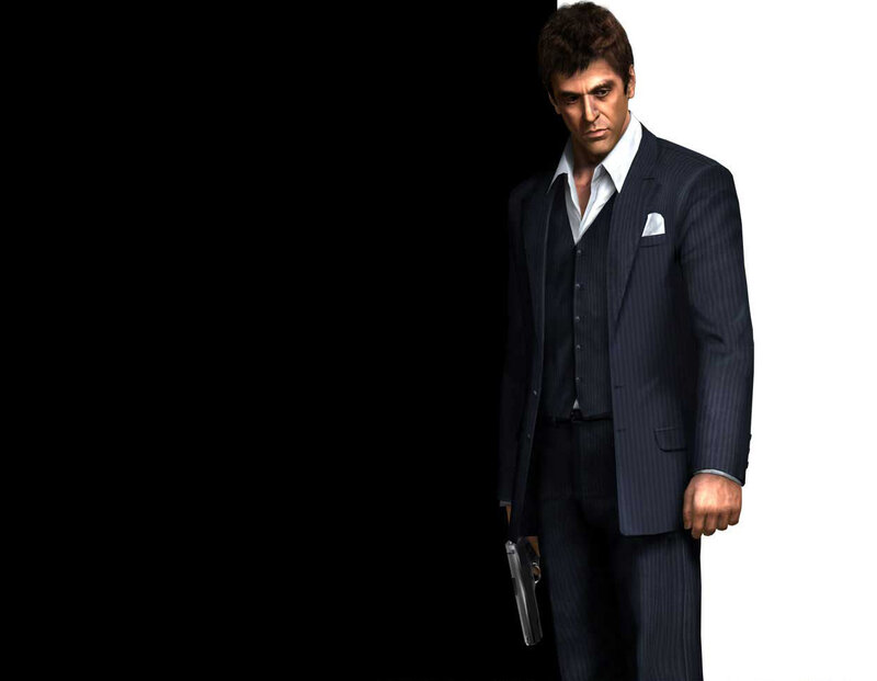 Man in a pinstripe suit holding a gun