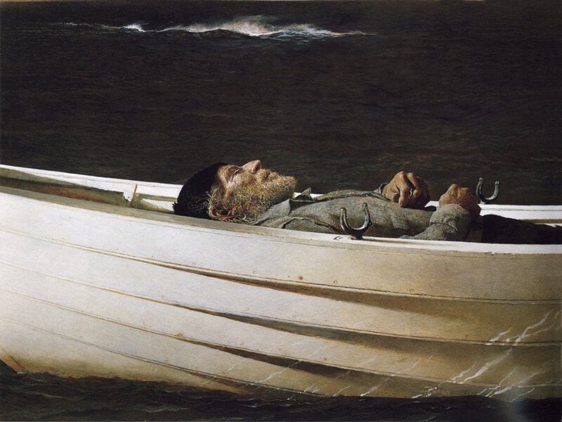 Man in a rowboat at sea
