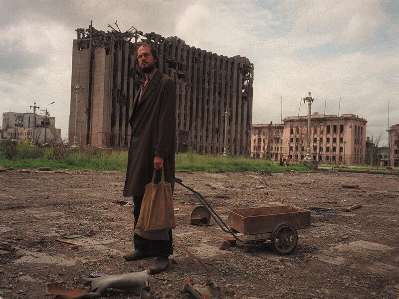 Man in a ruined city