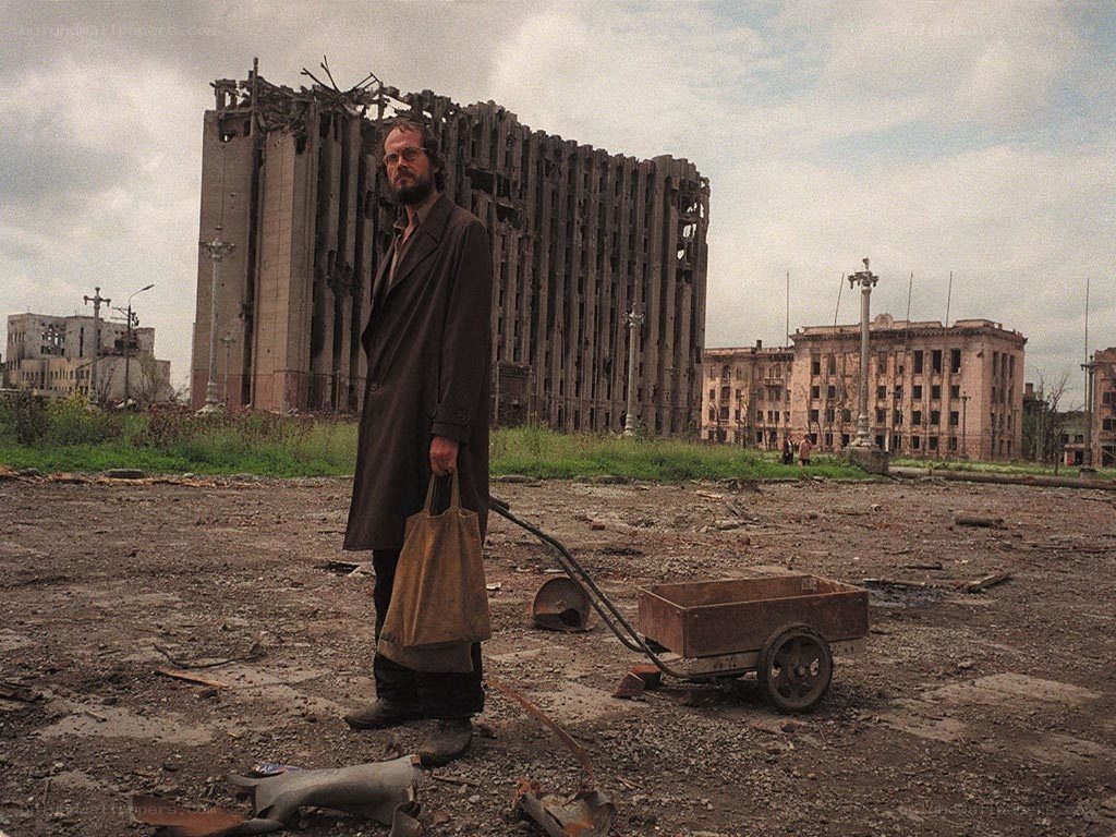 Man in a ruined city