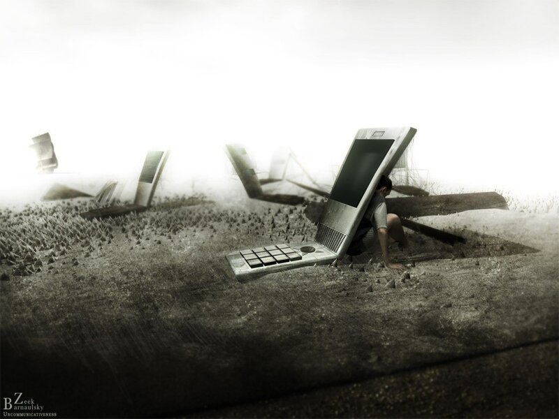 man in a sea of laptops