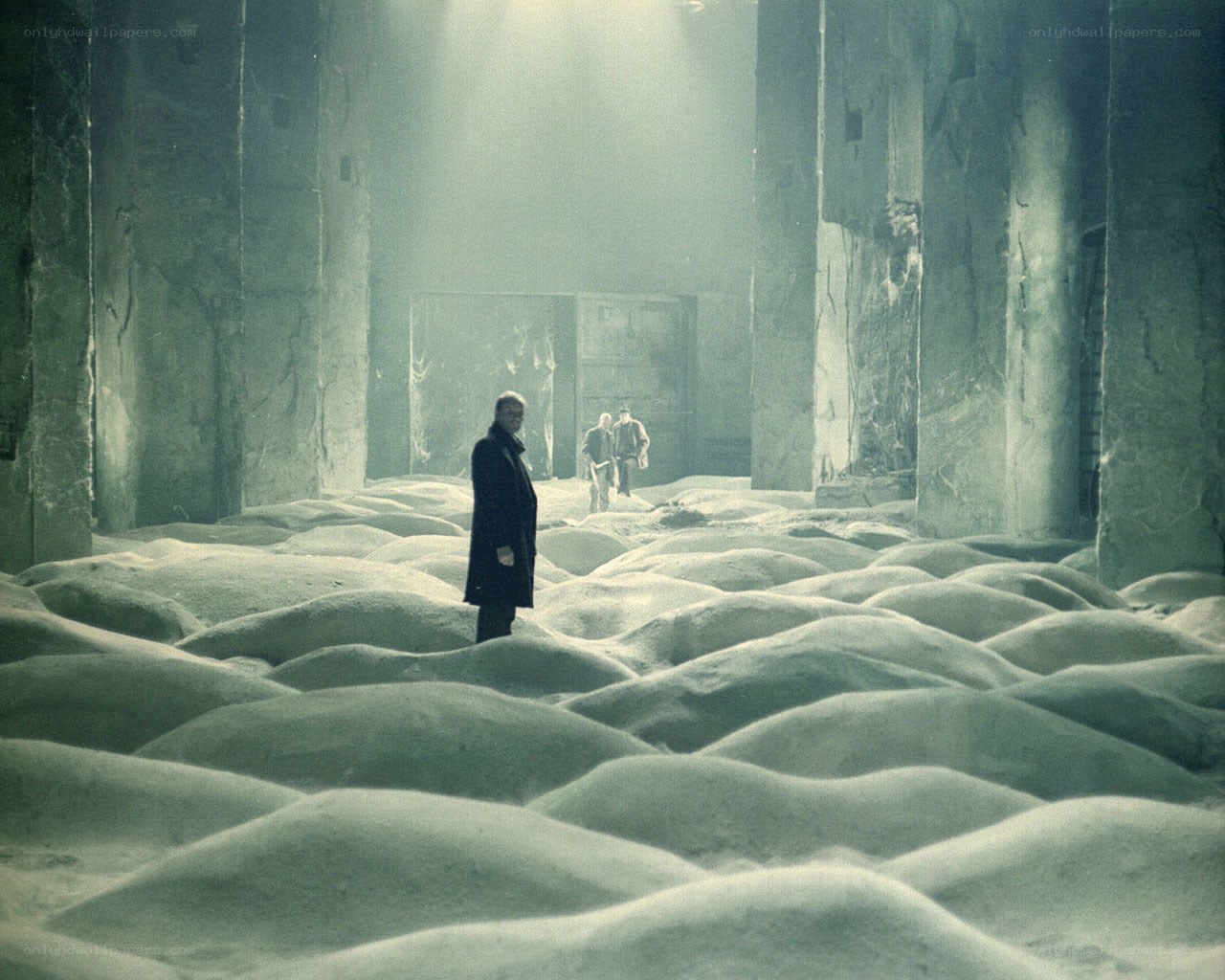Man in a snowy ruin