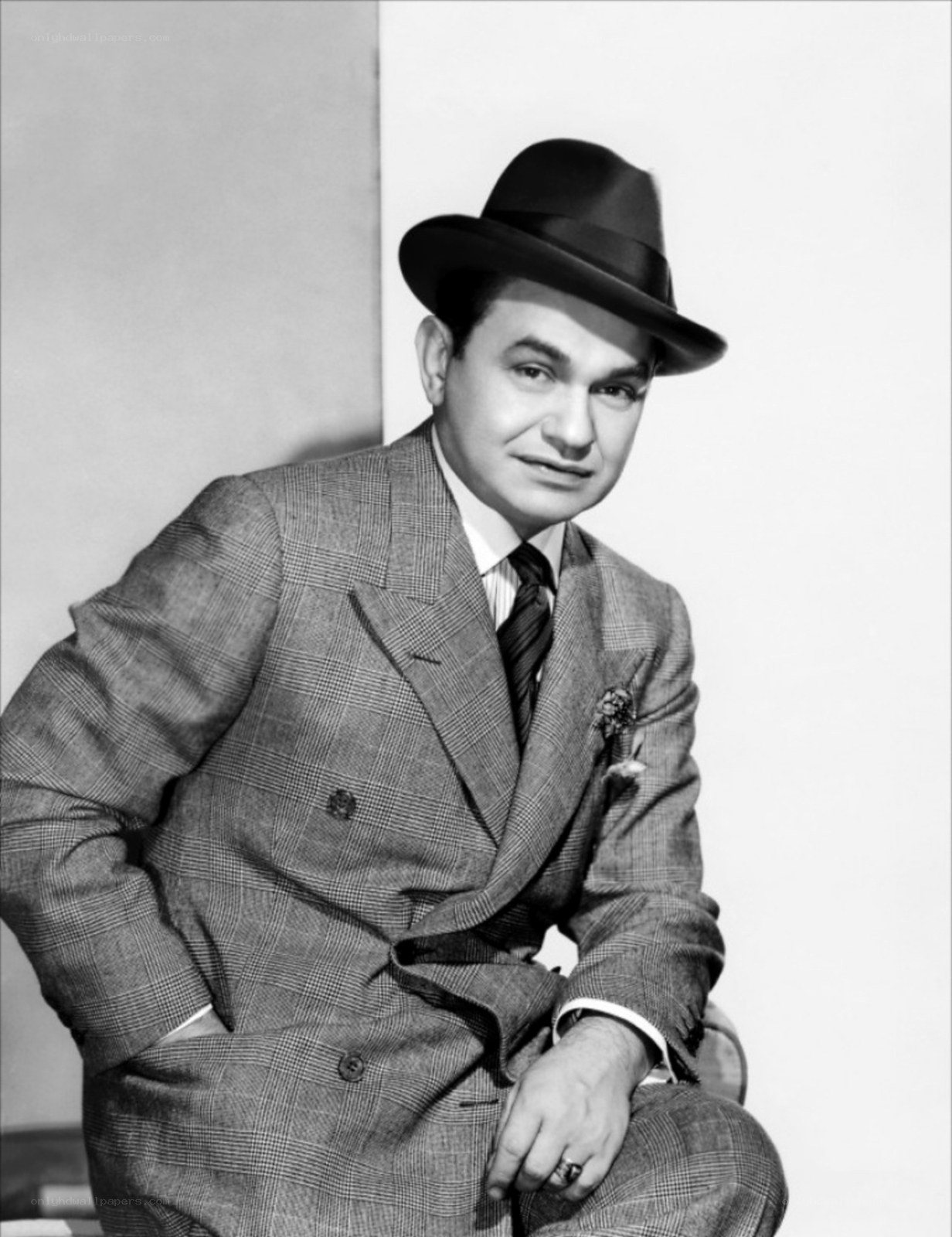 Man in a suit and hat