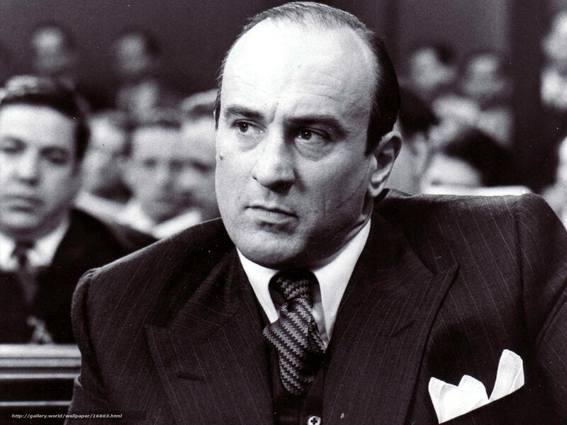 Man in a suit in a courtroom