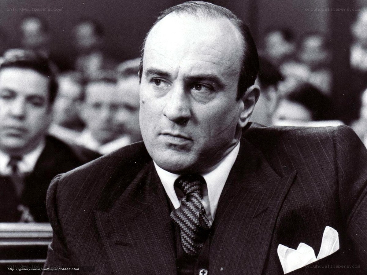Man in a suit in a courtroom