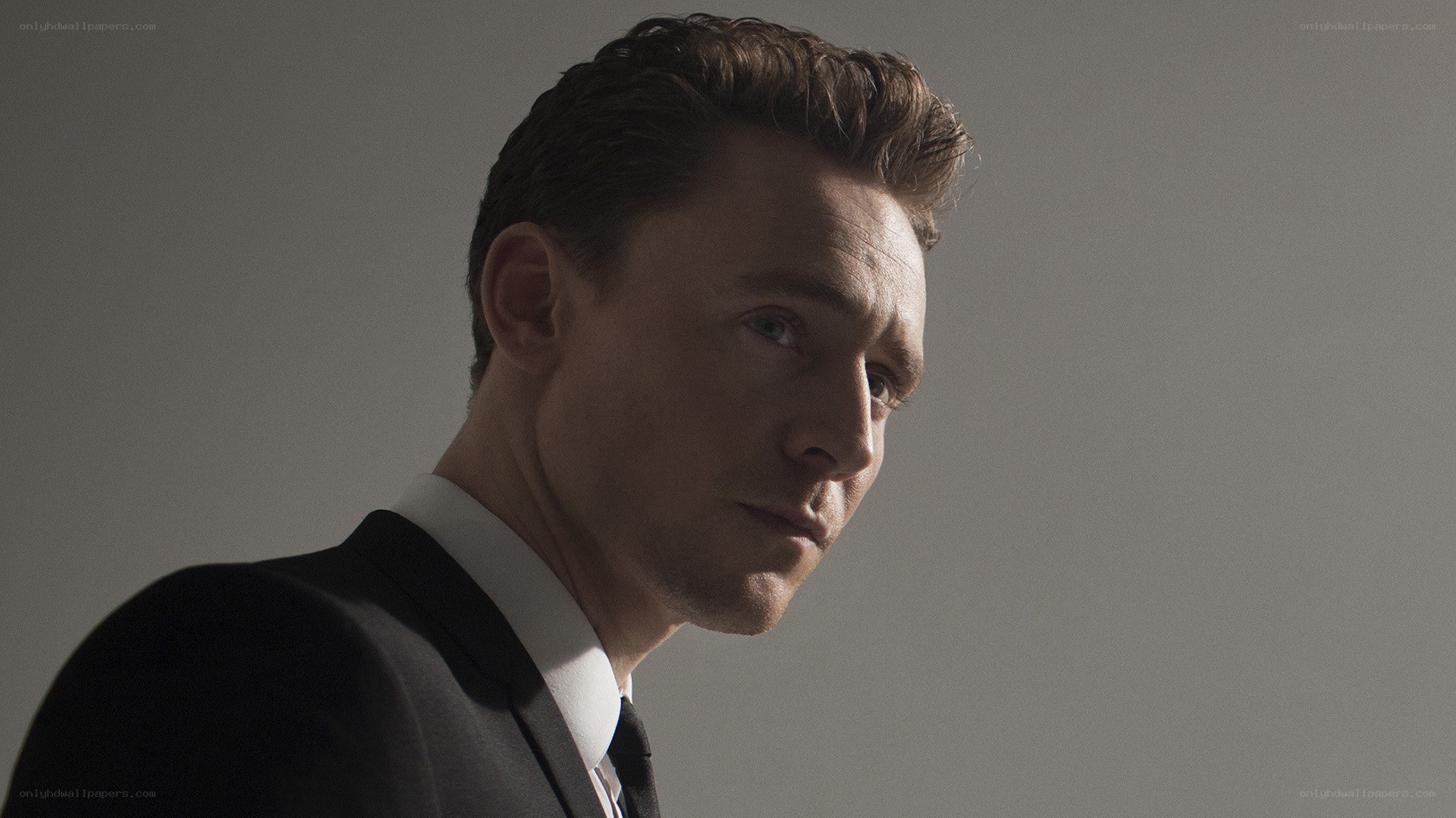 man in a suit looking away