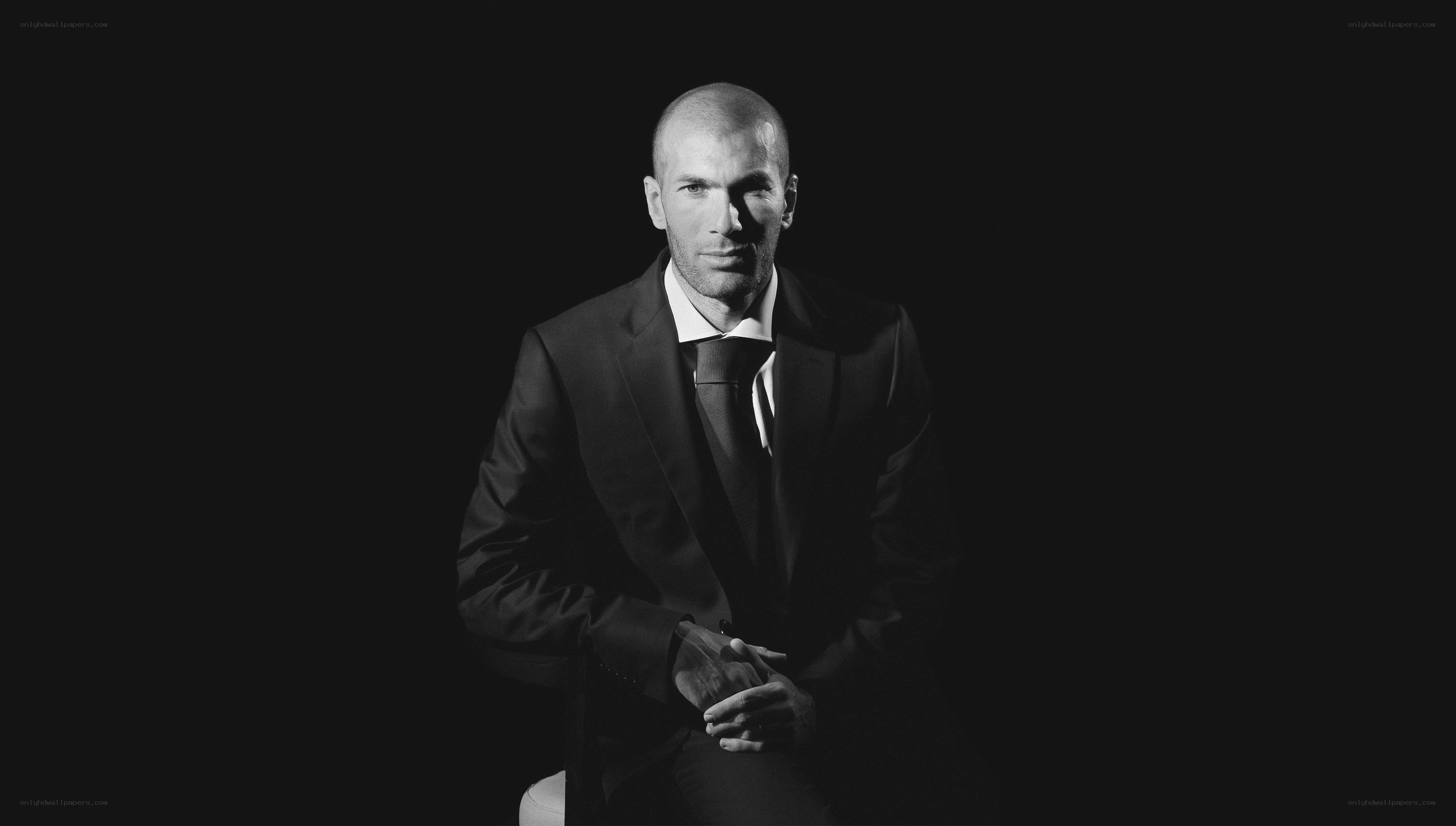 Man in a suit on black background
