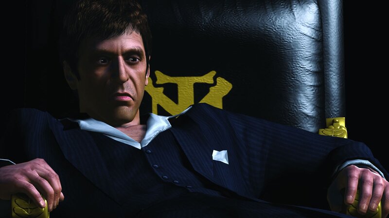 Man in a suit sitting in a chair