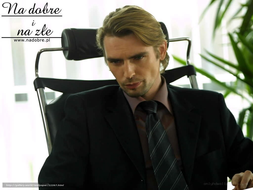 Man in a suit sitting in office