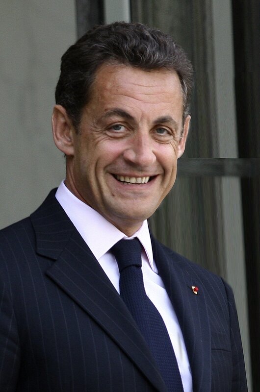 man in a suit smiling
