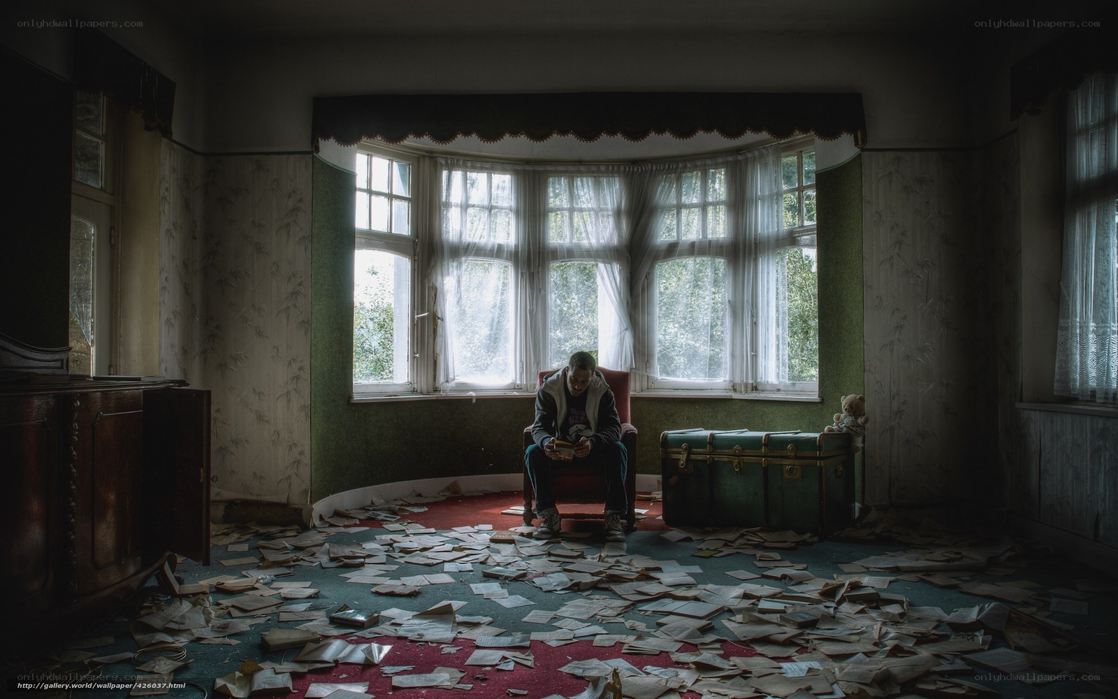 Man in abandoned room
