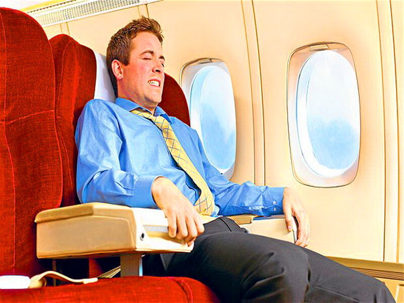 Man in Airplane Seat