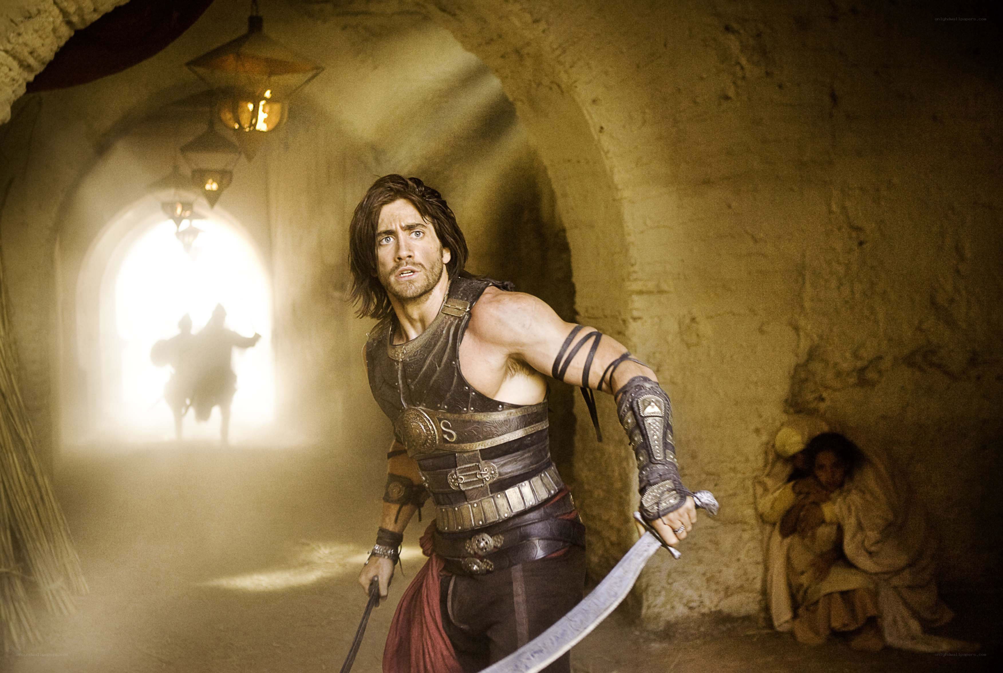 man in ancient tunnel with sword