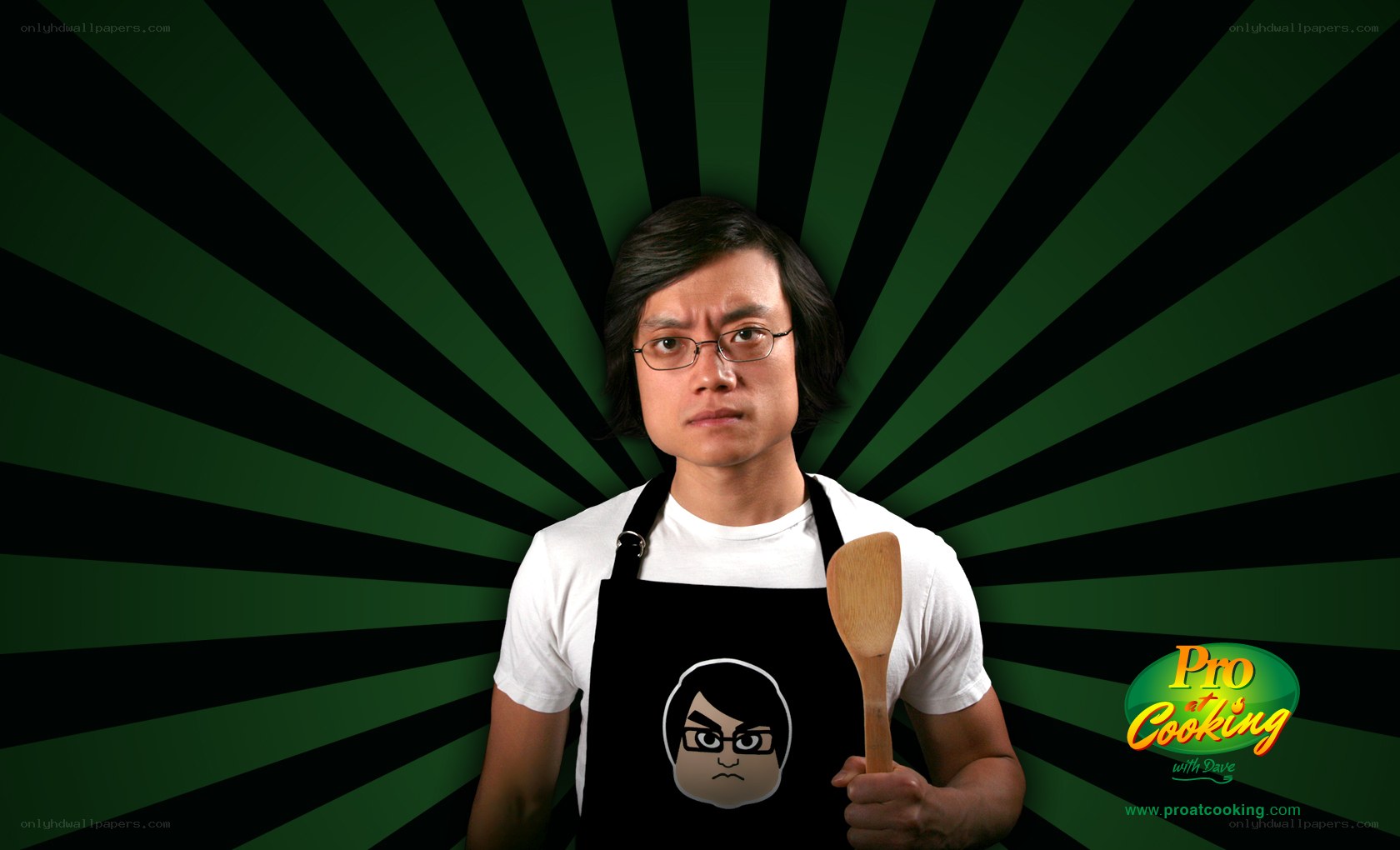 Man in apron with cooking spoon