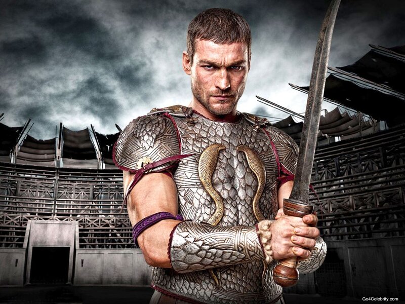 Man in Armor Holding Sword — Gray, Dramatic, Photograph, Arena