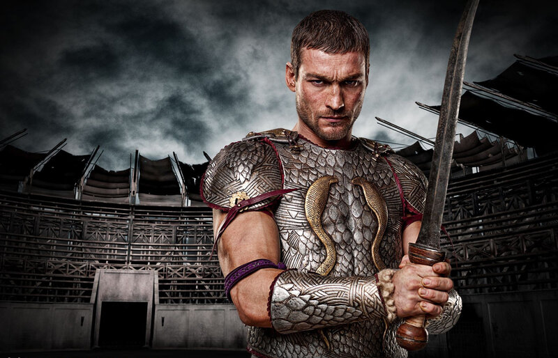 Man in Armor Holding Sword — Gray, Dramatic