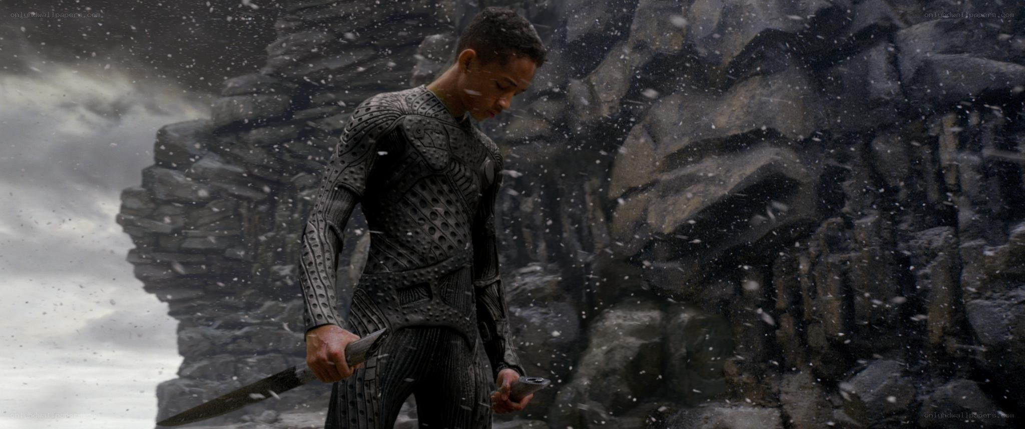 Man in armor holding sword