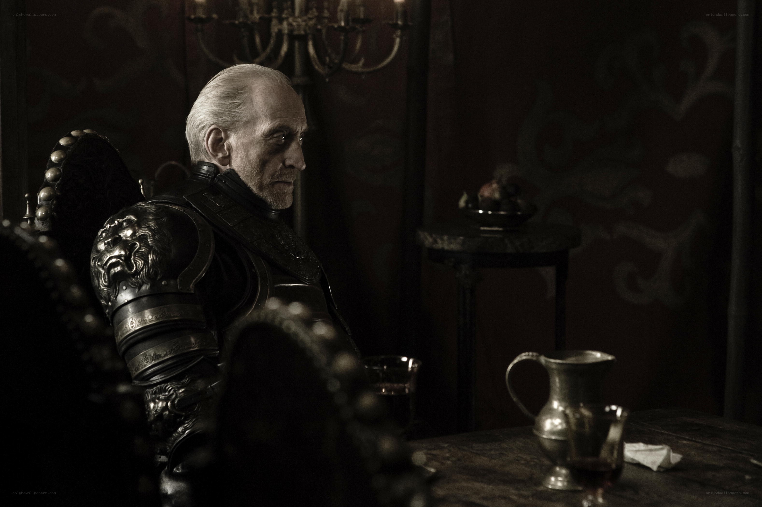 man in armor sitting at table