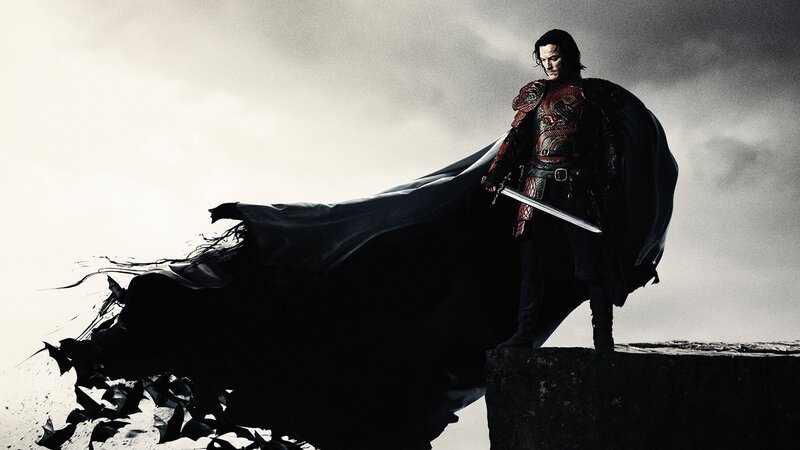 Man in Armor with Sword — Black, Dramatic, Photograph