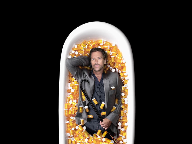 Man in bathtub of pills