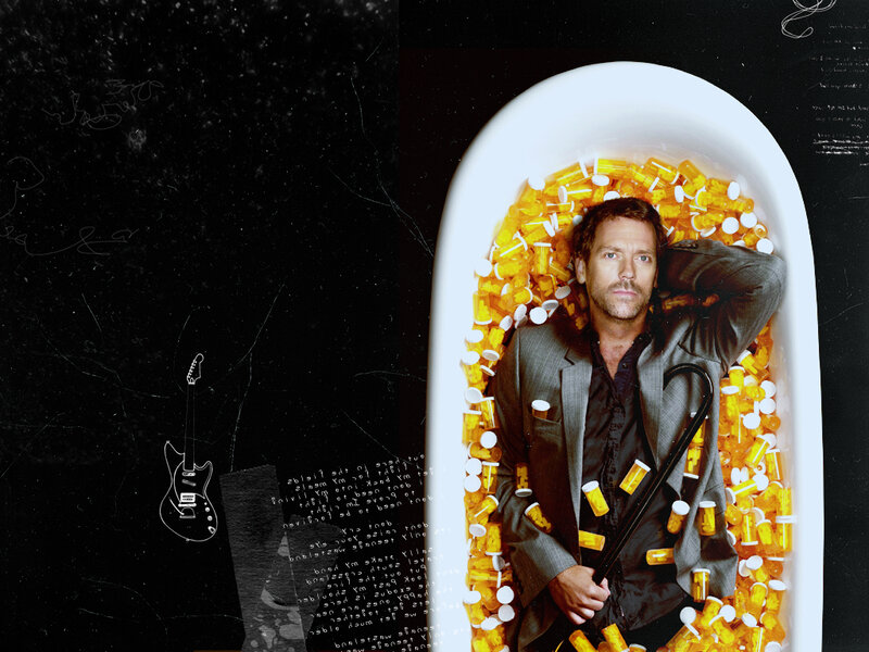 man in bathtub with pills