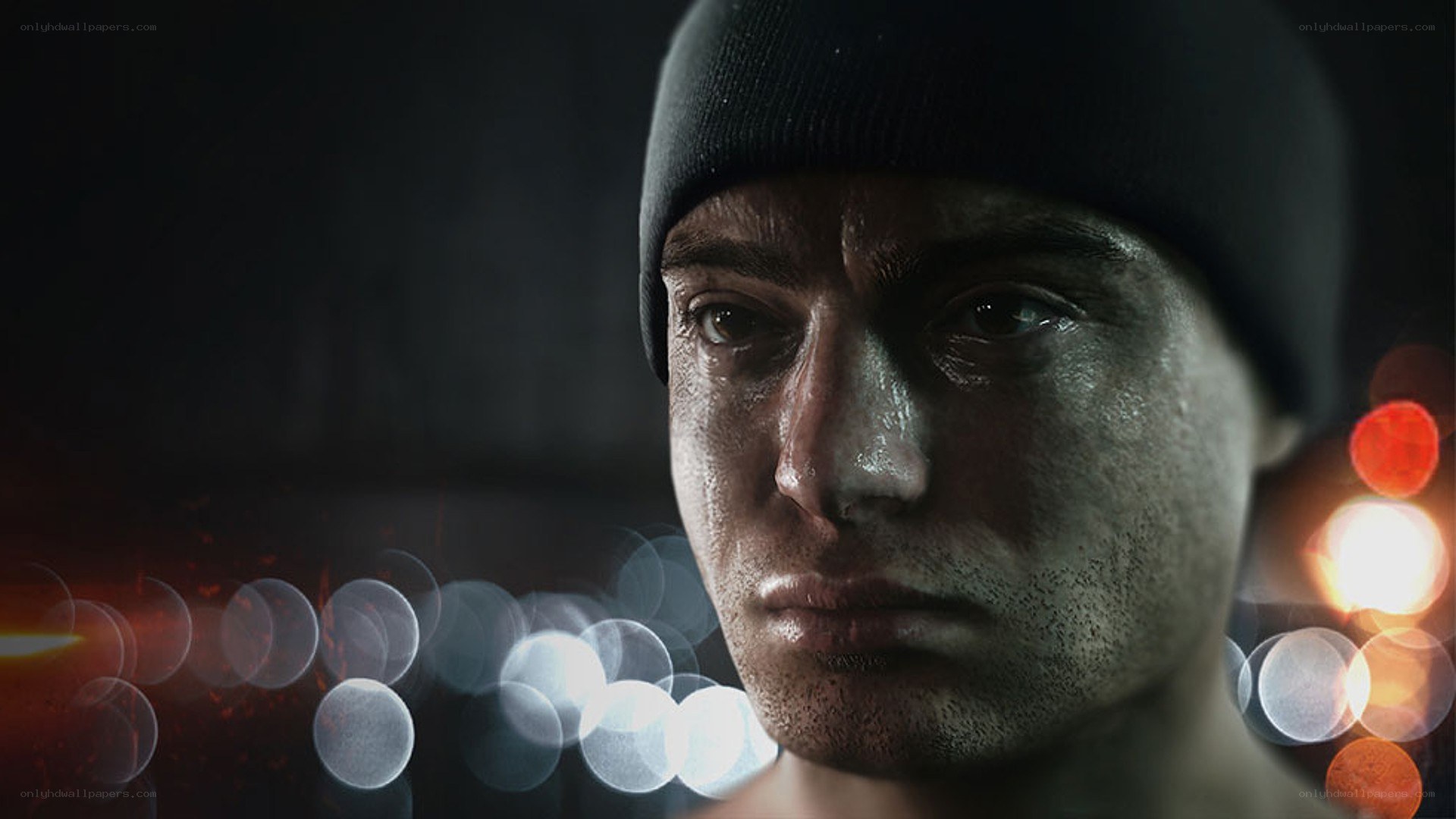man in beanie at night