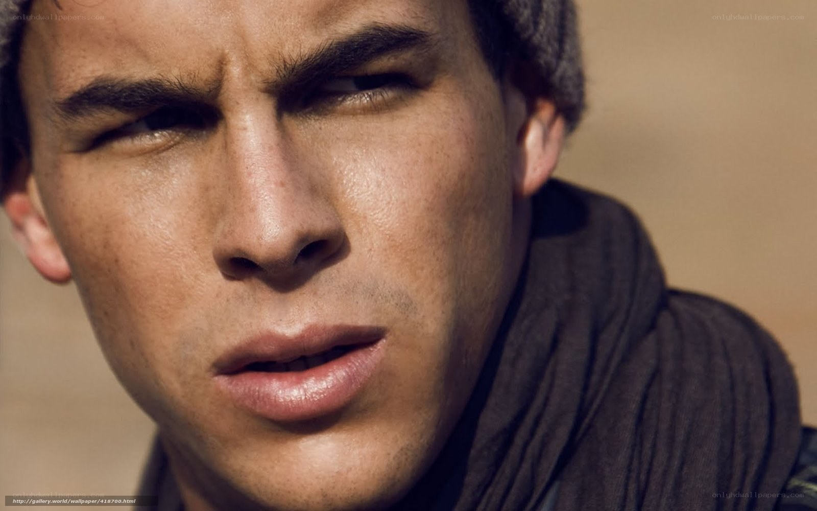 man in beanie close-up