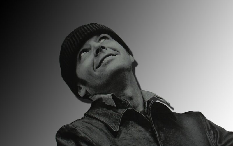 man in beanie looking up