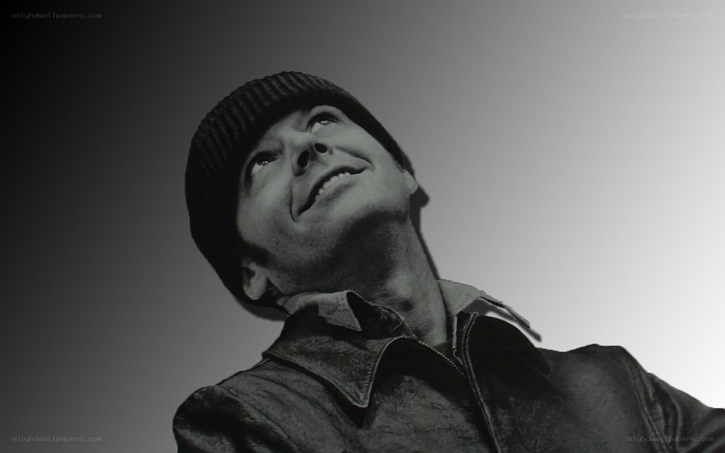 man in beanie looking up