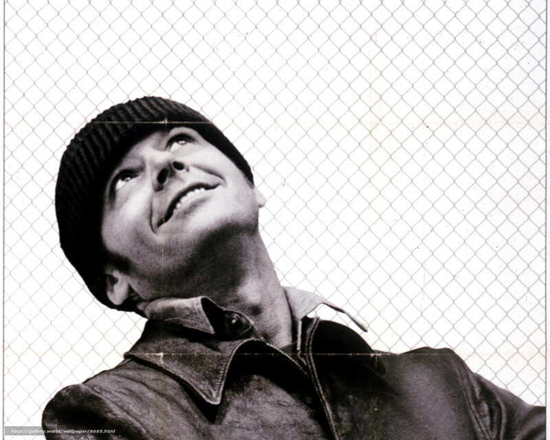 man in beanie looking up