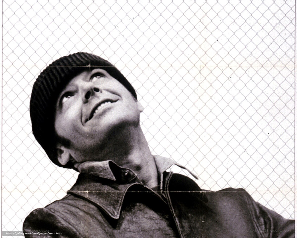 man in beanie looking up