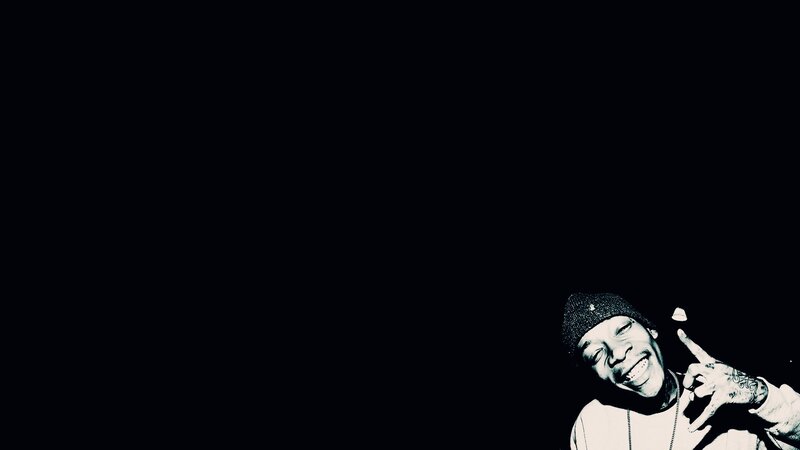man in beanie smiling