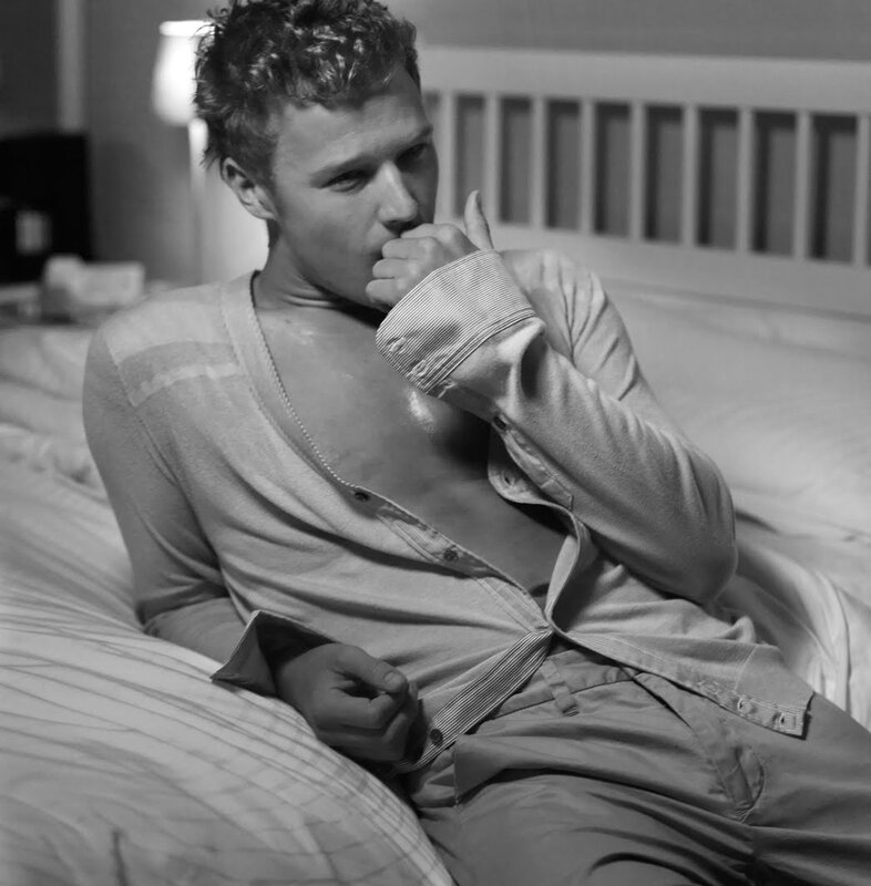 man in bed thinking