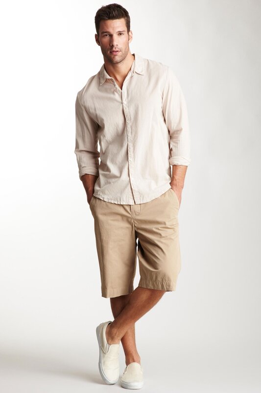 man in beige shirt and shorts