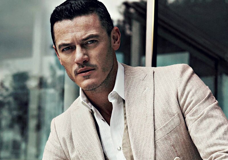 Man in Beige Suit — Serious