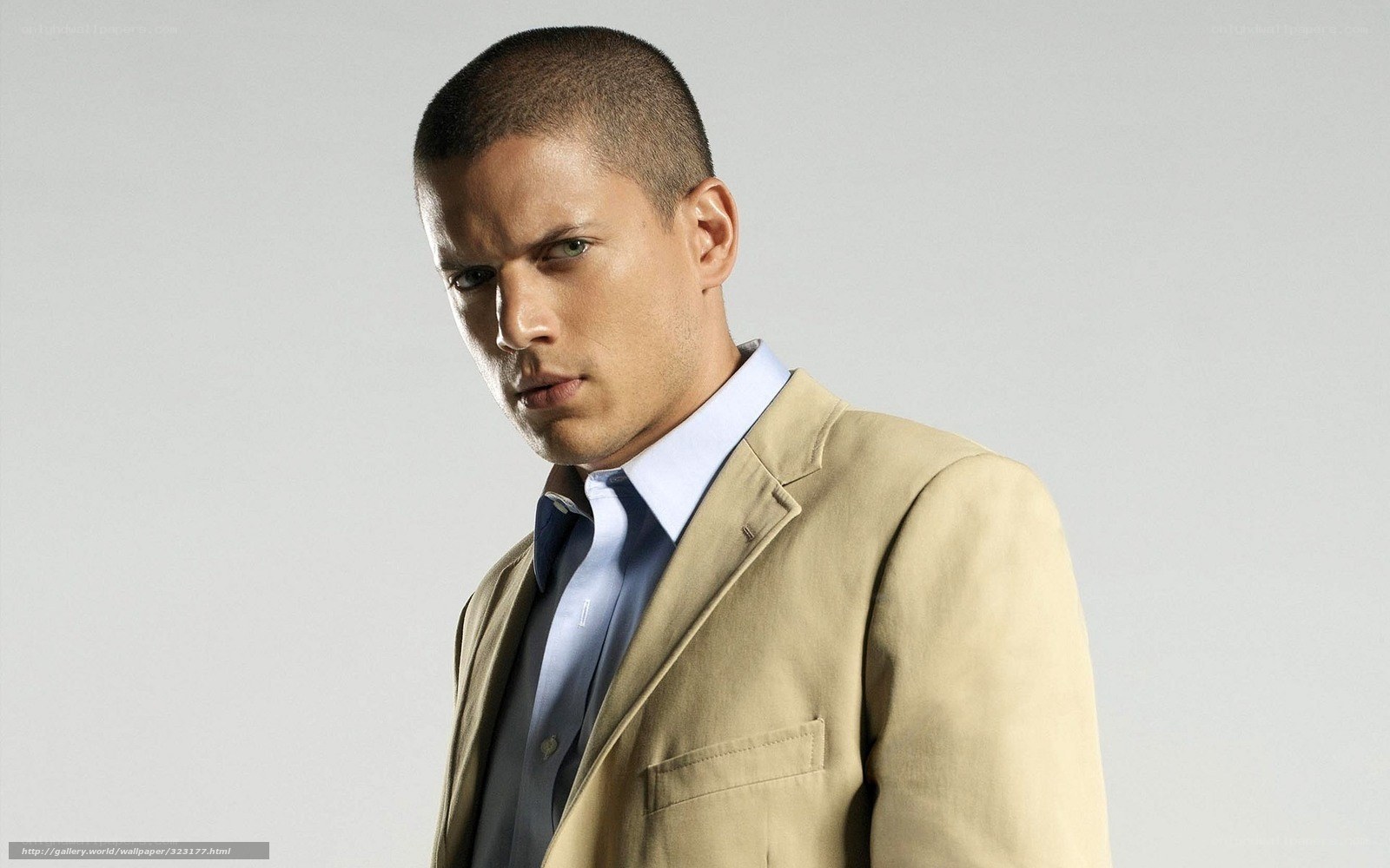 man in beige suit