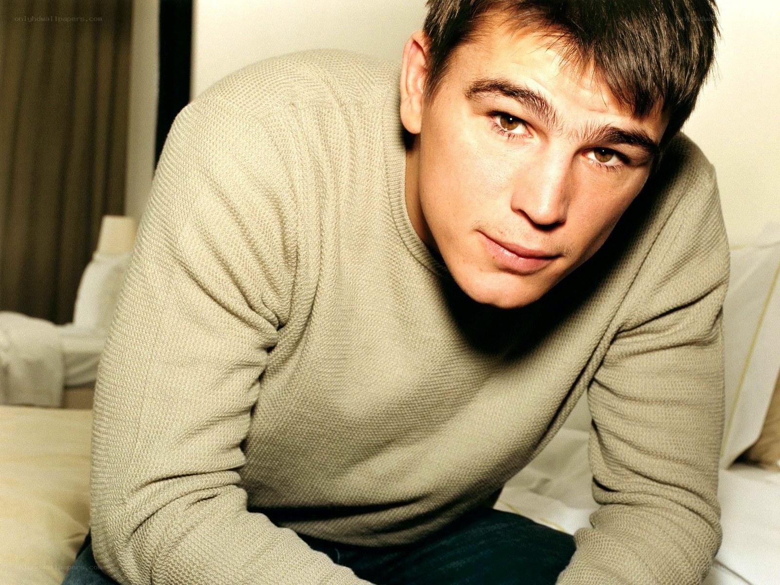 man in beige sweater