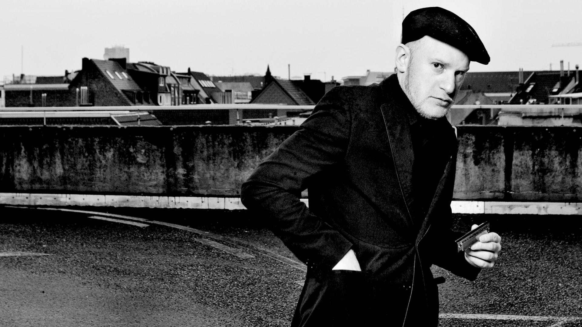 Man in beret on rooftop