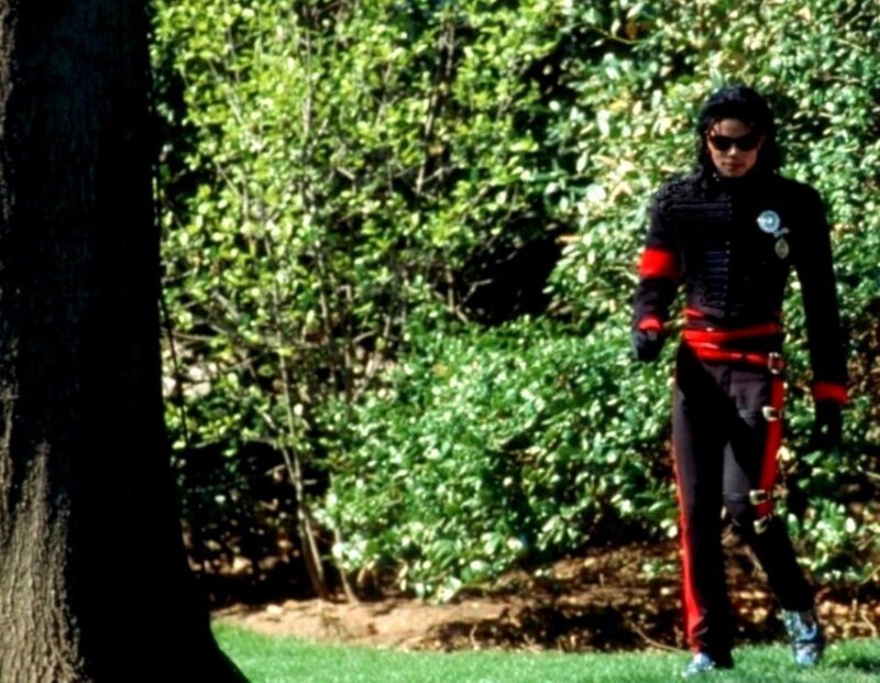 Man in Black and Red Outfit