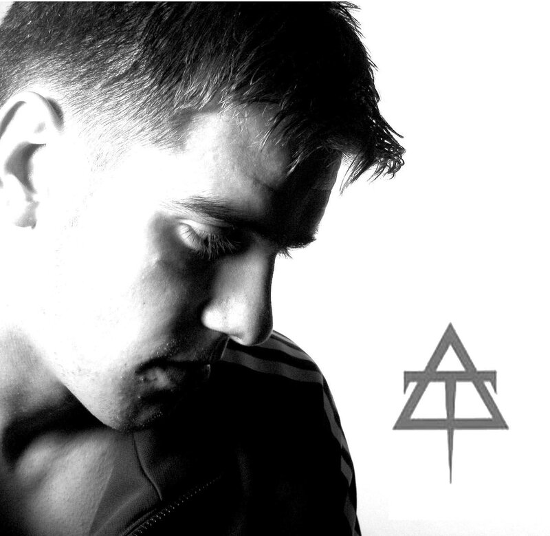 man in black and white with logo